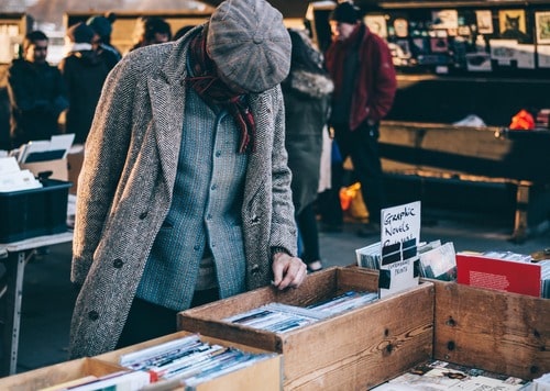 Canva - Person Standing in Front of Brown Crate-min